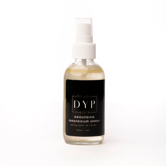 Bottle of DYP magnesium spray on a white background